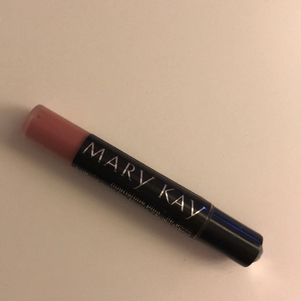 Very small tube of lipgloss